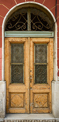 Image showing old ragged shabby wooden door