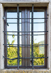 Image showing old window with metal bars 