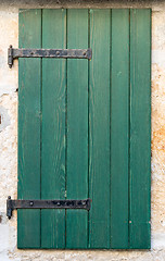 Image showing old window with   wooden shutters