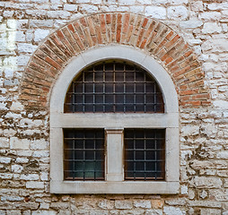 Image showing old window with metal bars 