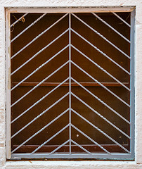 Image showing old window with metal bars 