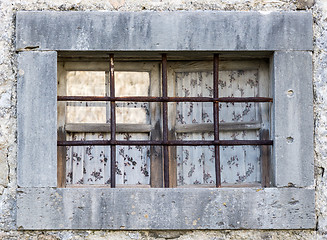 Image showing old window with metal bars