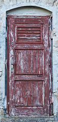 Image showing old brown yellow ragged shabby wooden door