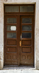Image showing old brown ragged shabby wooden door