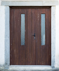 Image showing old brown ragged shabby wooden door