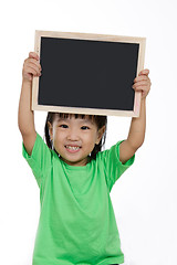 Image showing Asian Chinese little girl holding chalkboard 