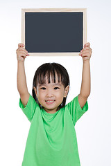 Image showing Asian Chinese little girl holding chalkboard 