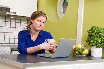 Image showing Morning Coffee at Computer