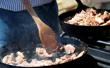 Image showing Dutch oven cooking.