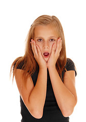 Image showing Scared looking young girl.