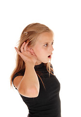 Image showing Young little girl can\'t hear.