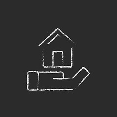 Image showing House insurance icon drawn in chalk.