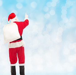 Image showing man in costume of santa claus with bag