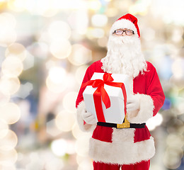 Image showing man in costume of santa claus with gift box