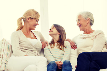 Image showing smiling family at home