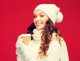 Image showing woman in hat with takeaway tea or coffee cup