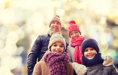 Image showing happy family in winter clothes outdoors