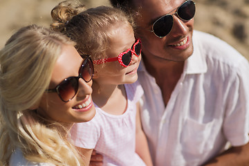 Image showing happy family in sunglasses on summer beach