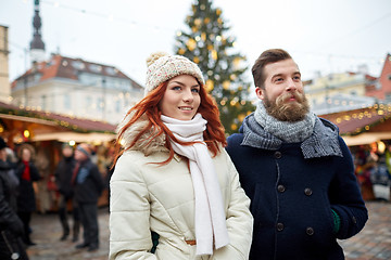 Image showing happy couple walking in old town