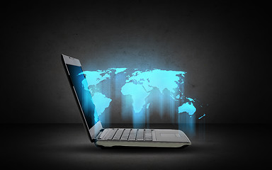 Image showing open laptop computer with world map