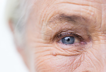 Image showing close up of senior woman face and eye