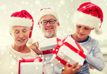 Image showing happy family sitting on couch at home