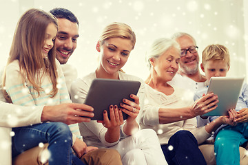 Image showing smiling family with tablet pc computers at home