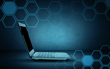 Image showing open laptop computer with hexagonal pattern