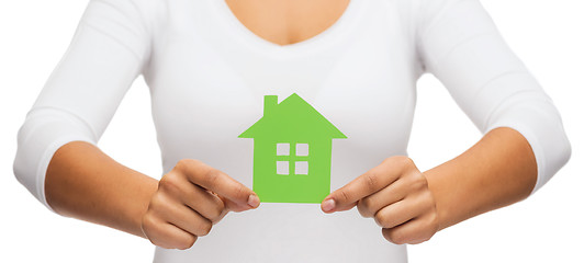 Image showing woman hands holding green house