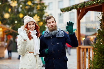 Image showing happy couple walking in old town