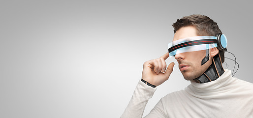 Image showing man with futuristic 3d glasses and sensors