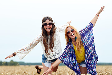 Image showing happy hippie women having fun on cereal field