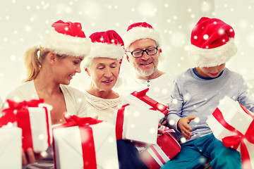 Image showing happy family sitting on couch at home