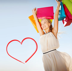 Image showing woman with shopping bags