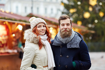 Image showing happy couple walking in old town