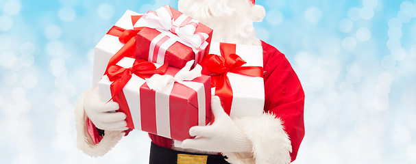 Image showing close up of santa claus with gift box