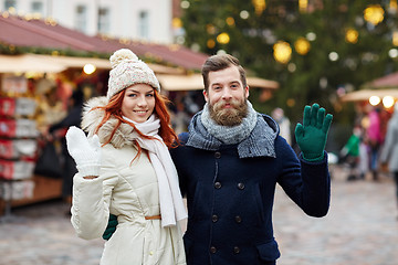 Image showing happy couple walking in old town