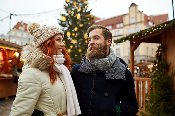 Image showing happy couple walking in old town