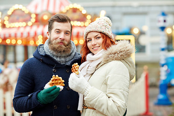 Image showing happy couple walking in old town