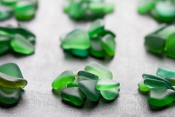 Image showing  green pieces of glass polished by the sea 