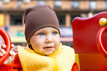Image showing Smiling little boy portrait outside