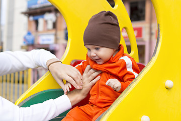 Image showing Baby boy on children's slide