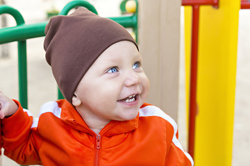Image showing Little boy smiling portrait outside
