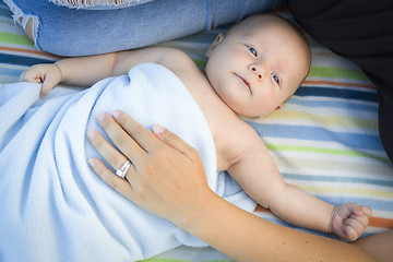 Image showing Little Baby Boy Wrapped In His Blanket Resting With Mommy