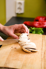 Image showing Female Slicing Mushrooms