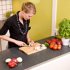 Image showing Woman Cutting Vegetables