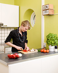 Image showing Woman Cutting Vegetables