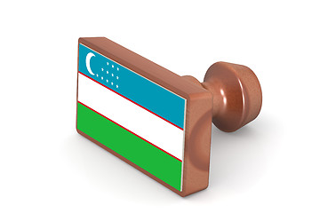 Image showing Wooden stamp with Uzbekistan flag