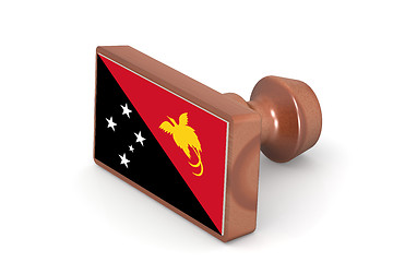 Image showing Wooden stamp with Papua New Guinea flag