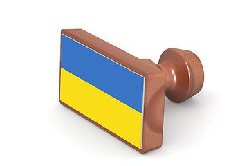 Image showing Wooden stamp with Ukraine flag